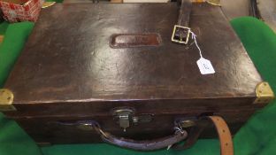 A leather bound oak framed fishing tackle motor case with brass reinforced corners, brass lever