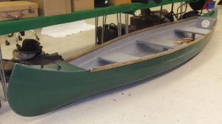 A modern fibreglass three person Canadian canoe CONDITION REPORTS Size approx. 90 cm wide maximum,