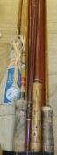A collection of four vintage fishing rod