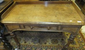 A late Victorian walnut washstand with t