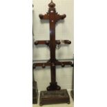 A 19th Century mahogany hall stand with turned hat / coat hooks and metal-lined drip tray to base
