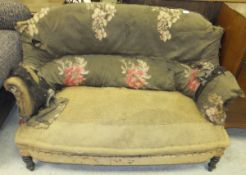 A 19th century French upholstered scroll