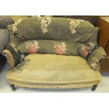 A 19th century French upholstered scroll