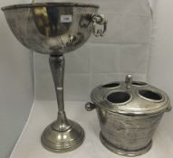 A floor standing cast metal wine cooler