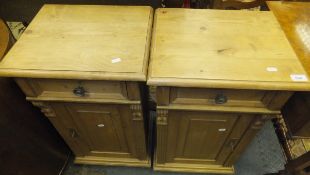 A pair of waxed pine bedside cabinets, t