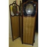 An Edwardian mahogany and inlaid threefold dressing screen, the glazed upper section inset with