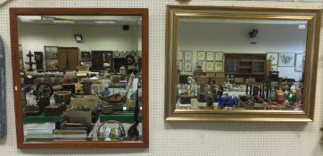 A modern gilt framed mirror with bevelle