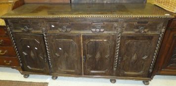 An early 20th century oak sideboard with