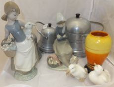 A Lladro figure of a girl with lamb and