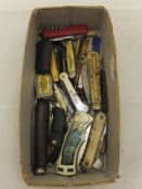 A box containing assorted penknives to i