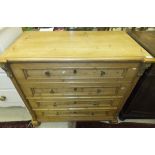 A 19th Century pine commode, the plain t