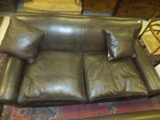 WITHDRAWN A modern brown leather upholst