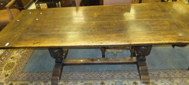 An oak refectory style dining table, on