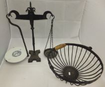 A pair of iron scales with ceramic plate