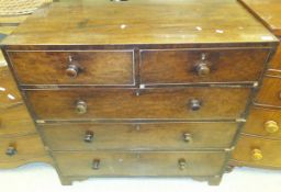 An early 19th century mahogany chest of