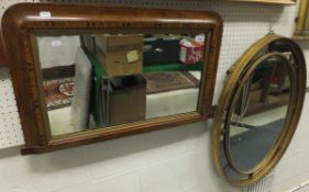 A Victorian gilt framed oval wall mirror