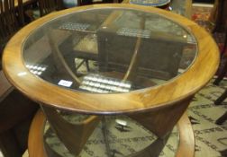 A circular G Plan teak coffee table with