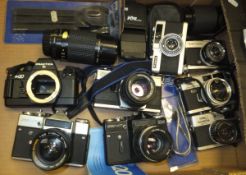 A box of cameras and camera equipment to