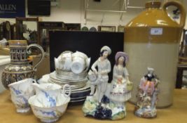 A collection of Shelley tea wares decorated with flowers and with gilt borders, a Mettlach style