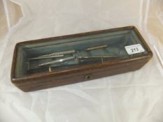 A Victorian leather jewellery box with g