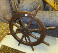 A turned teak ship's wheel
