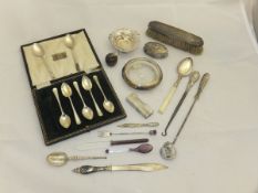 A box of assorted silver items to includ