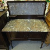 A mahogany wash stand with marble top an