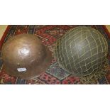 A German military helmet, together with