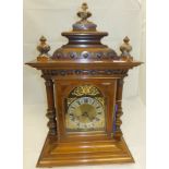 A circa 1900 walnut bracket clock, the b