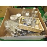 A box containing various dressing table