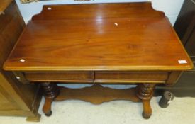 A Victorian mahogany side table with two