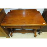 A Victorian mahogany side table with two