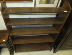 An oak Arts and Crafts style bookcase CONDITION REPORTS Wear, scuffs, stains, chips.  Large split to