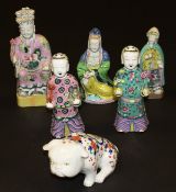 A collection of five various 19th Century Chinese polychrome decorated figures, and an Imari palette