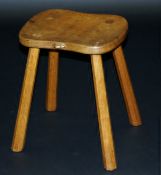 An oak stool by Robert Thompson The Mous