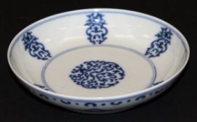 A Chinese blue and white saucer in the 18th Century taste, bearing Daoguang seal mark verso, 15.5 cm