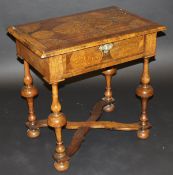 An 18th Century and later walnut and seaweed marquetry inlaid side table, the medallion decorated