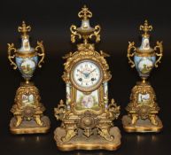 A 19th Century French gilt metal cased and porcelain bodied clock garniture in the Sèvres taste, the