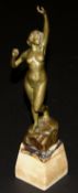 TITZE - an early 20th Century German bronze of standing nude figure awakening, raised on a marble