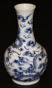 A Chinese blue and white gourd shaped porcelain vase with blue and white decoration of five five-
