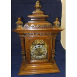 A circa 1900 walnut bracket clock, the b