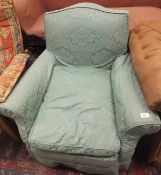 A circa 1900 shaped back armchair with s