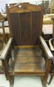 A pine throne chair with triple panelled