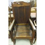 A pine throne chair with triple panelled