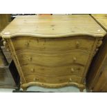 A modern pine serpentine fronted chest o