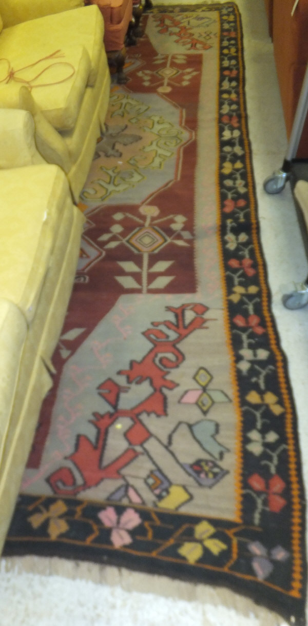 A Kelim rug, the central motif in pale b