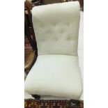 A Victorian upholstered buttoned back nu