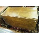 A mahogany rounded rectangular drop leaf