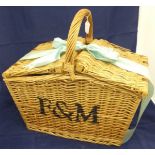 A Fortnum & Mason wicker picnic hamper