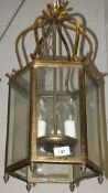 An octagonal gilt metal framed hanging lantern CONDITION REPORTS Approx 59cm high.  Wear, tarnish